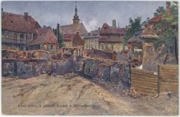 Kozí ulice, v pozadí kostel u Milosrdných